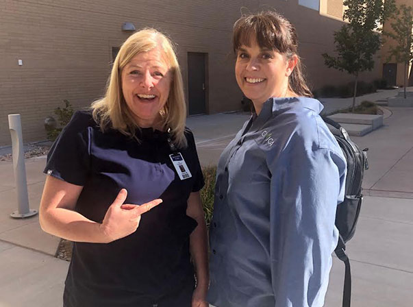 two women smiling